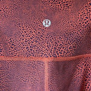 Size28 Lululemon Athletica Red Leggings with Intricate Pattern
